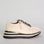Le Sansa Skippa Cream sneakers with white and cream colorway, featuring sleek design and casual comfort for everyday wear.