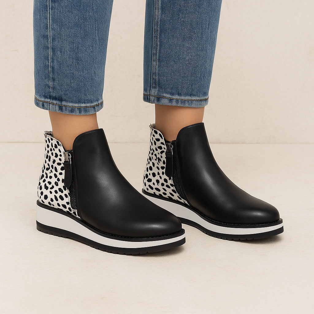 LE SANSA Stow Black Snow Pony boots with durable winter design and waterproof features, ideal for snowy weather.