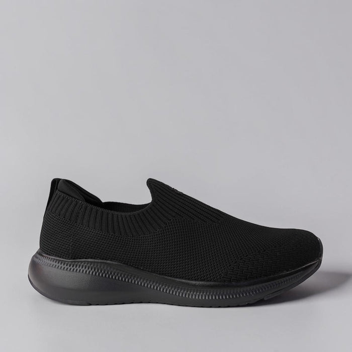 Black Cabello CABELLO STRIDE Jet Black sneakers with sleek design and white sole, shown from front angle.