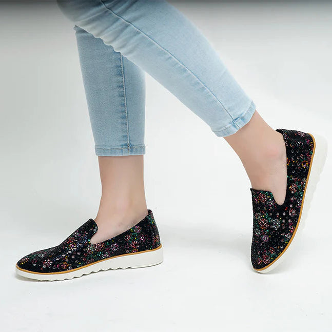 CC Resorts Austin black print slip-ons featuring a stylish black and white pattern, perfect for casual wear.