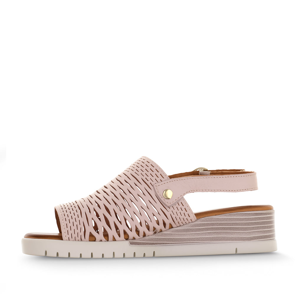 Le Sansa Topaz Blush sandals with stylish straps, featuring a blush pink color and comfortable flat sole, ideal for casual wear.