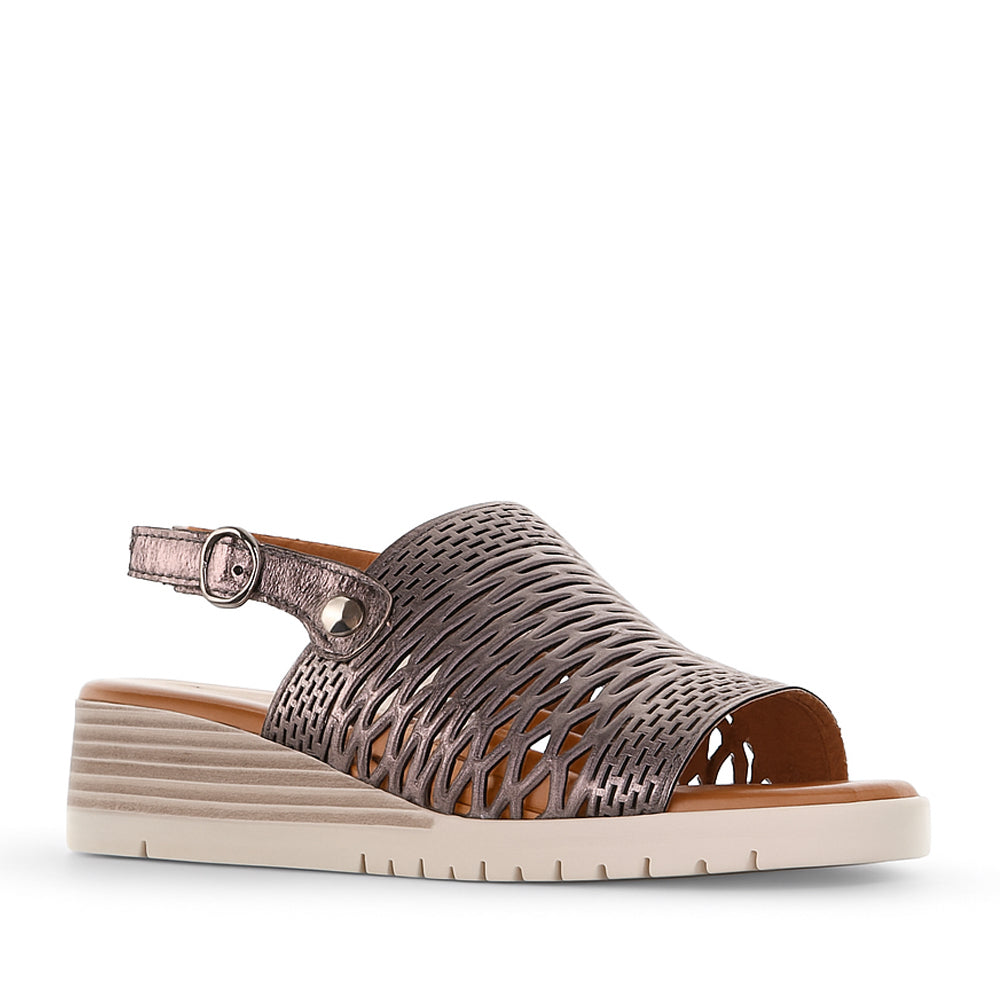 Le Sansa Topaz Pewter sandals with metallic finish, open toe design, and ankle strap for stylish summer footwear.