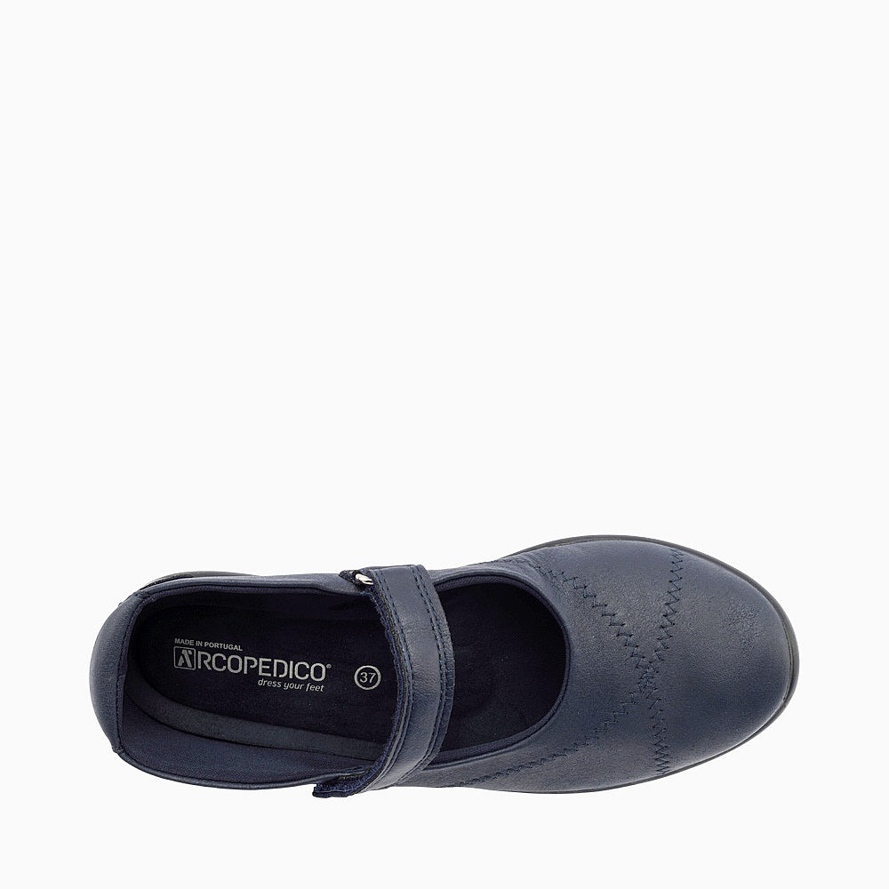 Navy Arcopedico Triglav Mary Jane shoe with rounded toe and adjustable strap, showcasing comfortable, stylish footwear.