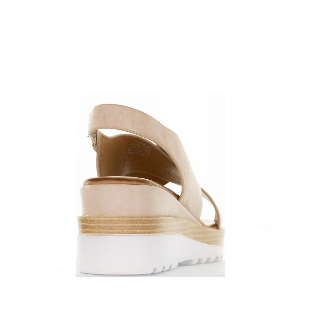 LE SANSA Trisha Blush sandals featuring open-toe design, blush pink straps, and flat sole, perfect for casual summer wear.