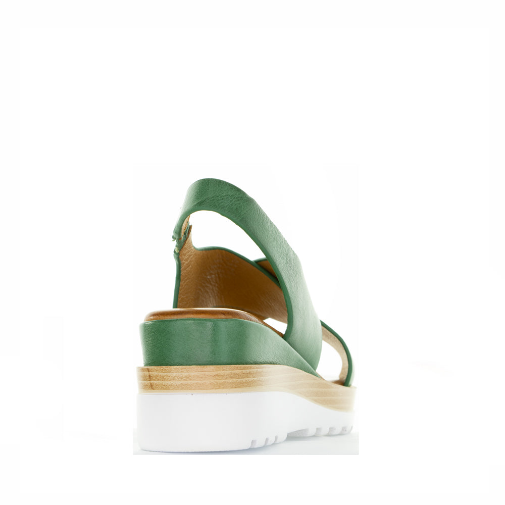 Le Sansa Lesansa Trisha Pine sandals with open toe design and ankle straps, displayed on a neutral background.