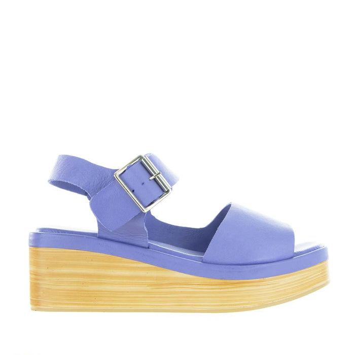 Le Sansa True Purple sandals with open toe design and ankle strap, showcasing vibrant purple leather material.
