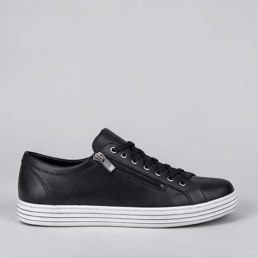 Black CABELLO Unity sneakers featuring a sleek design with white sole and modern style, displayed on a plain background.
