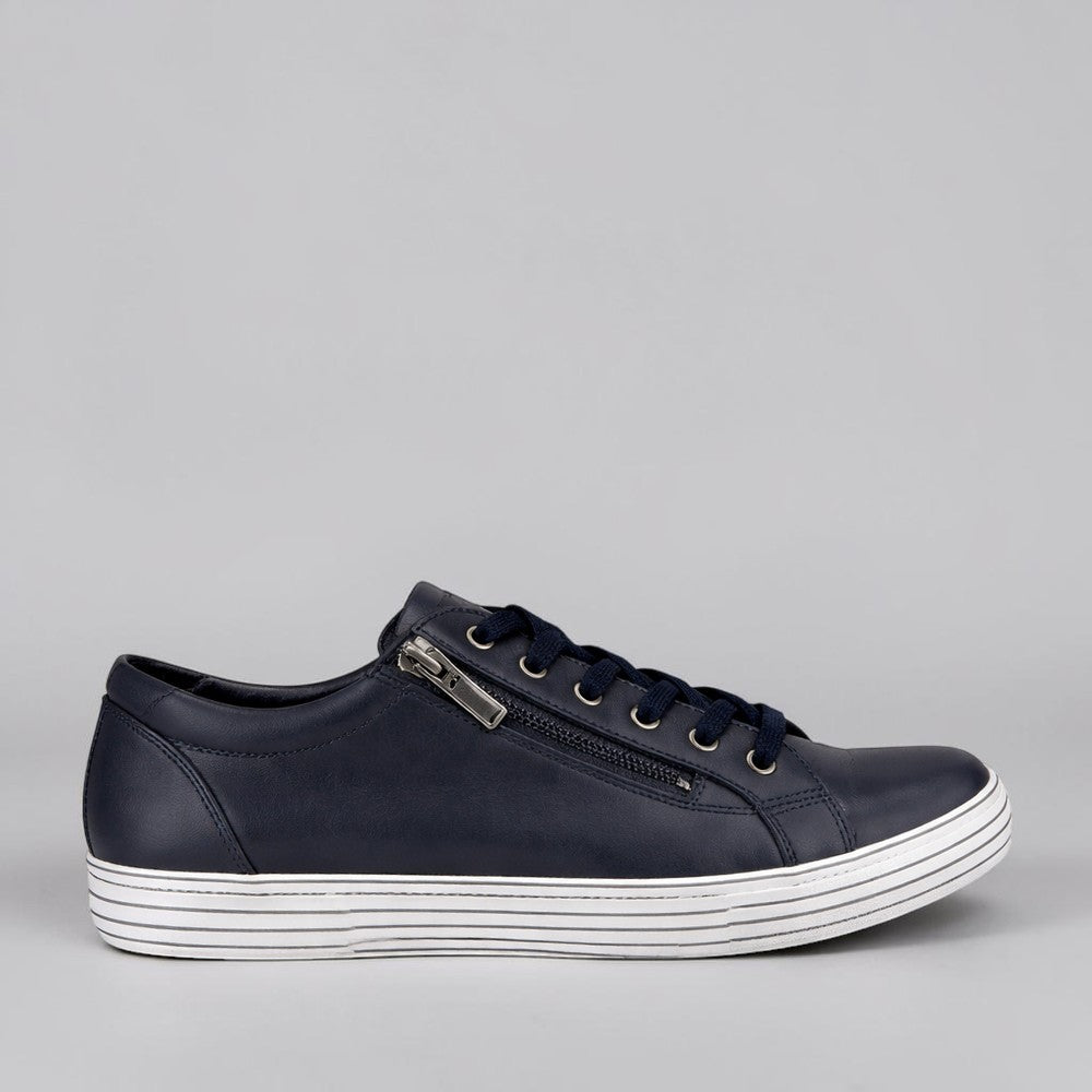 CABELLO Unity Navy sneakers featuring blue canvas upper, white rubber sole, and lace-up design for casual style.