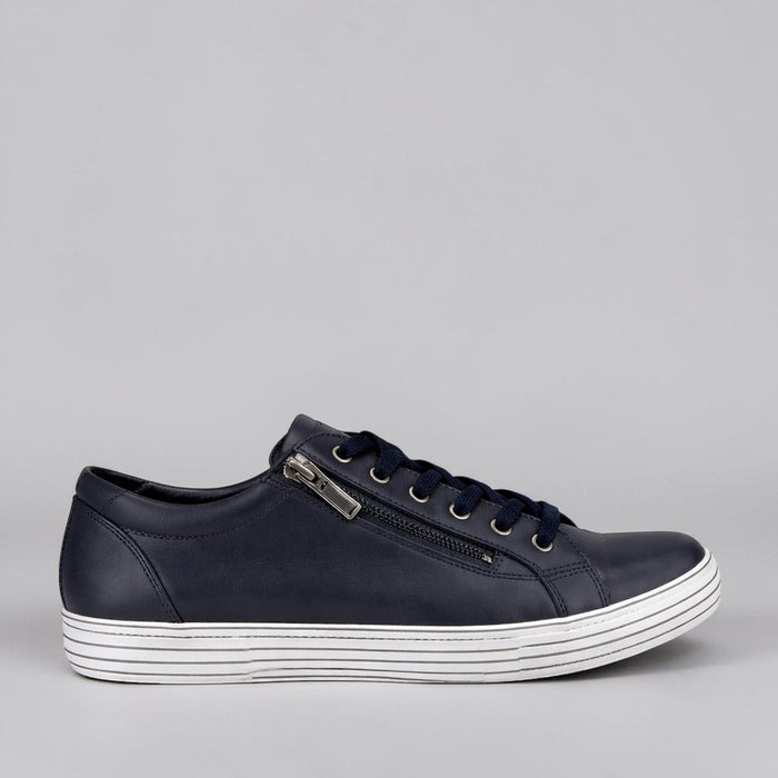 CABELLO Unity Navy sneakers featuring blue canvas upper, white rubber sole, and lace-up design for casual style.