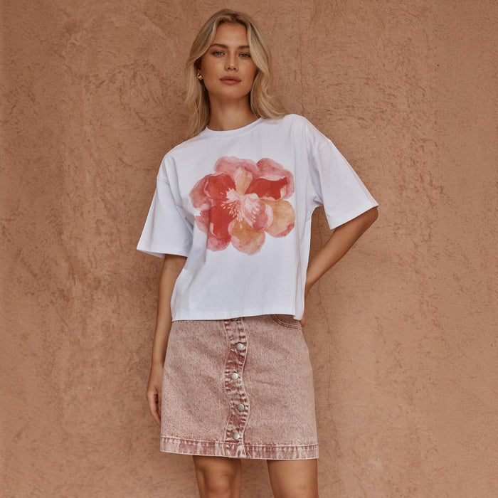 Sass Clothing Peony print tee featuring a colorful floral design on a casual top, perfect for everyday wear.