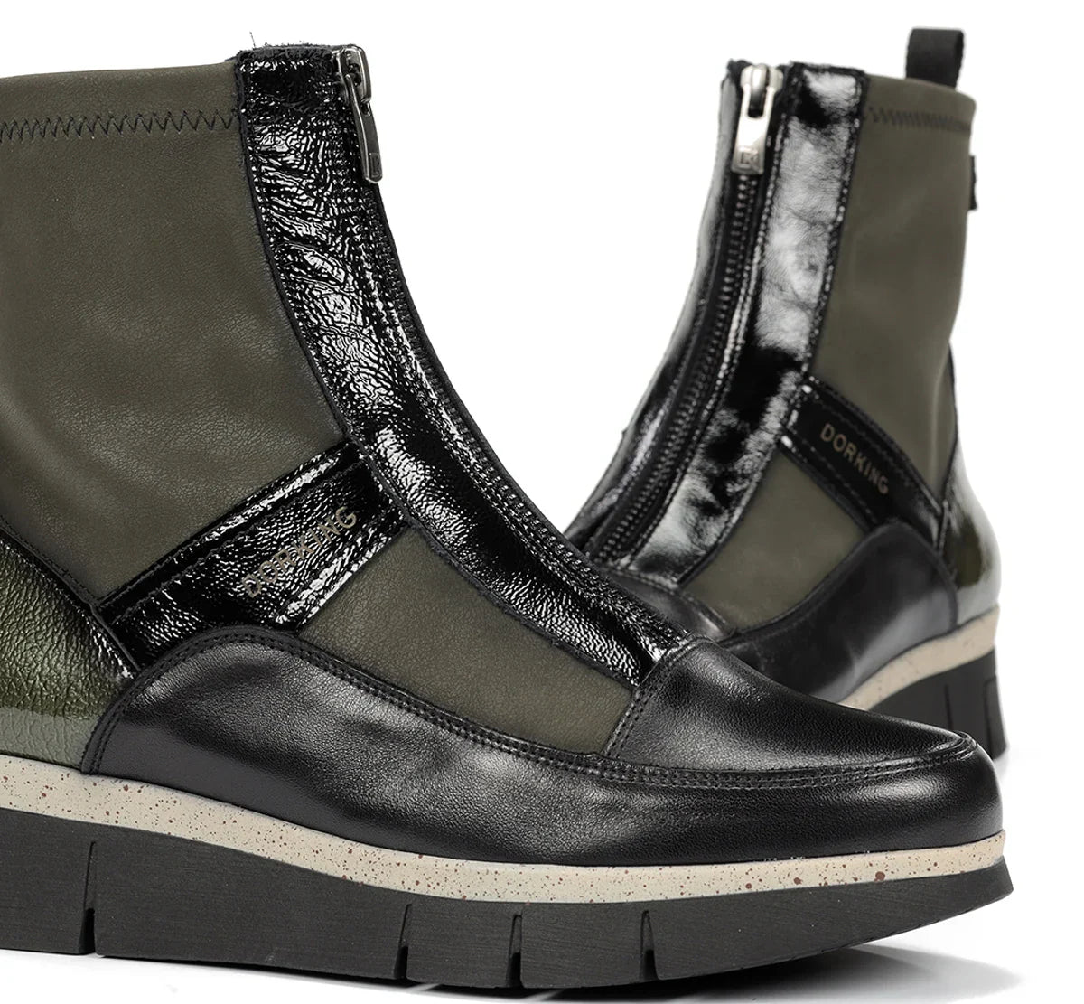 Dorking India Rowena Herb boots featuring ankle-high design, leather material, and stylish silhouette with laces and heel.