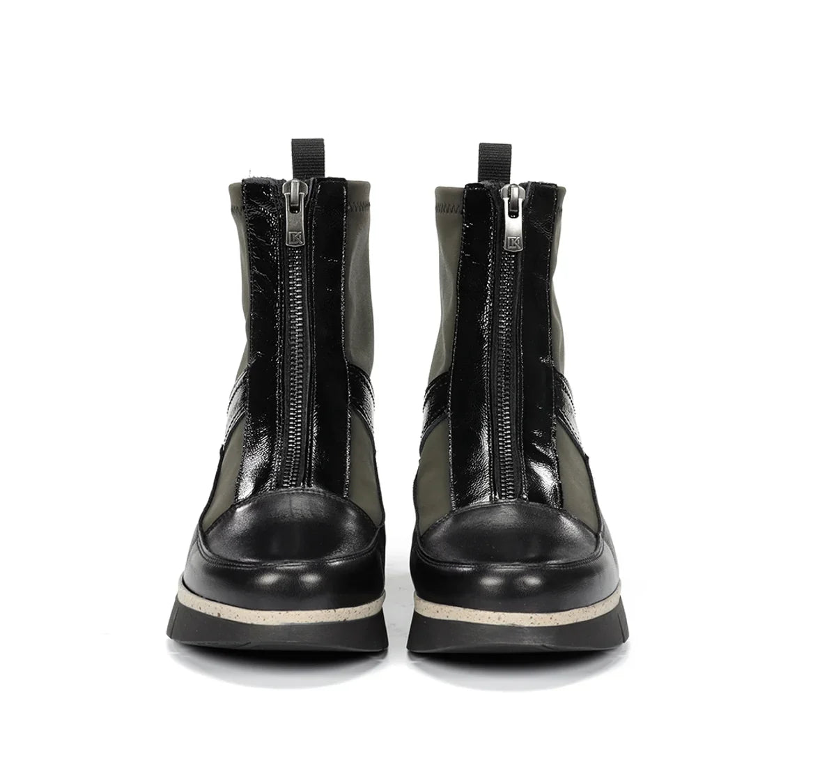 Dorking India Rowena Herb boots featuring ankle-high design, leather material, and stylish stitching details.