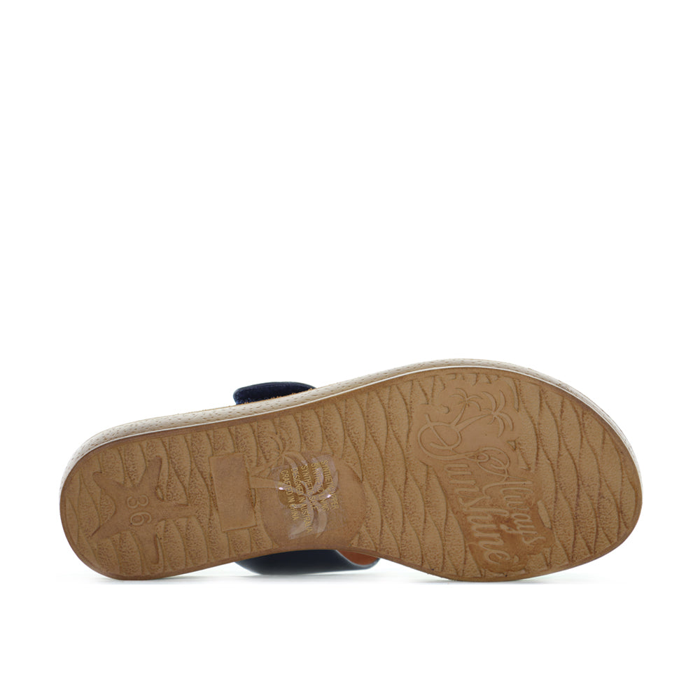 VS Treads Velma flats in emerald navy with silver accents, showcasing a stylish, comfortable slip-on shoe for women.