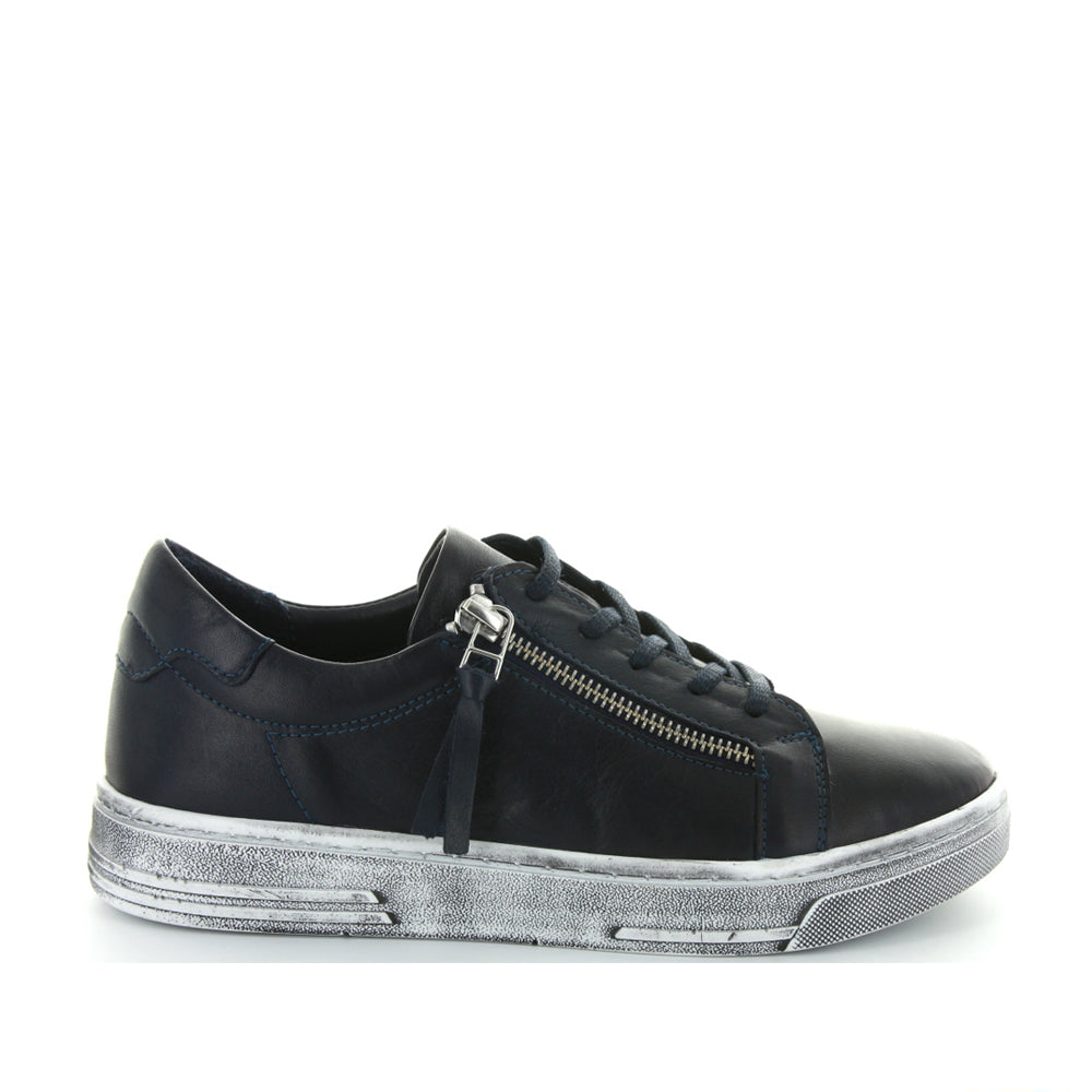 Le Sansa Warren Navy sneakers with navy blue fabric and white sole, featuring lace-up design and casual style.