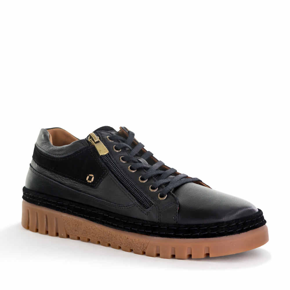 Black CABELLO Wren sneakers with sleek design and white sole, showcasing stylish and comfortable footwear.