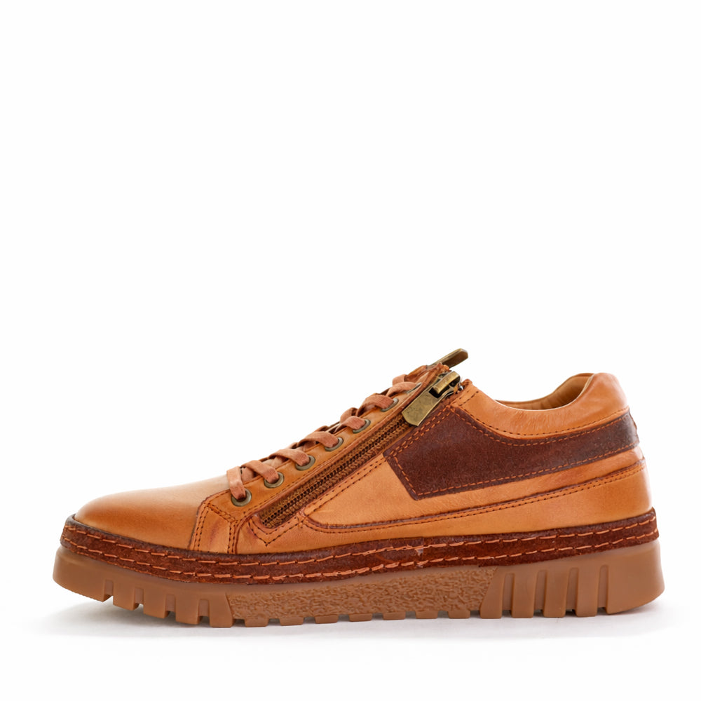 CABELLO Wren Tan sneakers featuring tan leather uppers, white soles, and stylish lace-up design for casual wear.