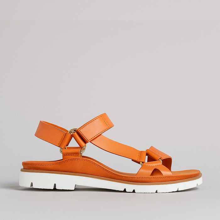 Orange Yakka sandals by VS Treads, featuring strappy design and casual style, shown in the image.