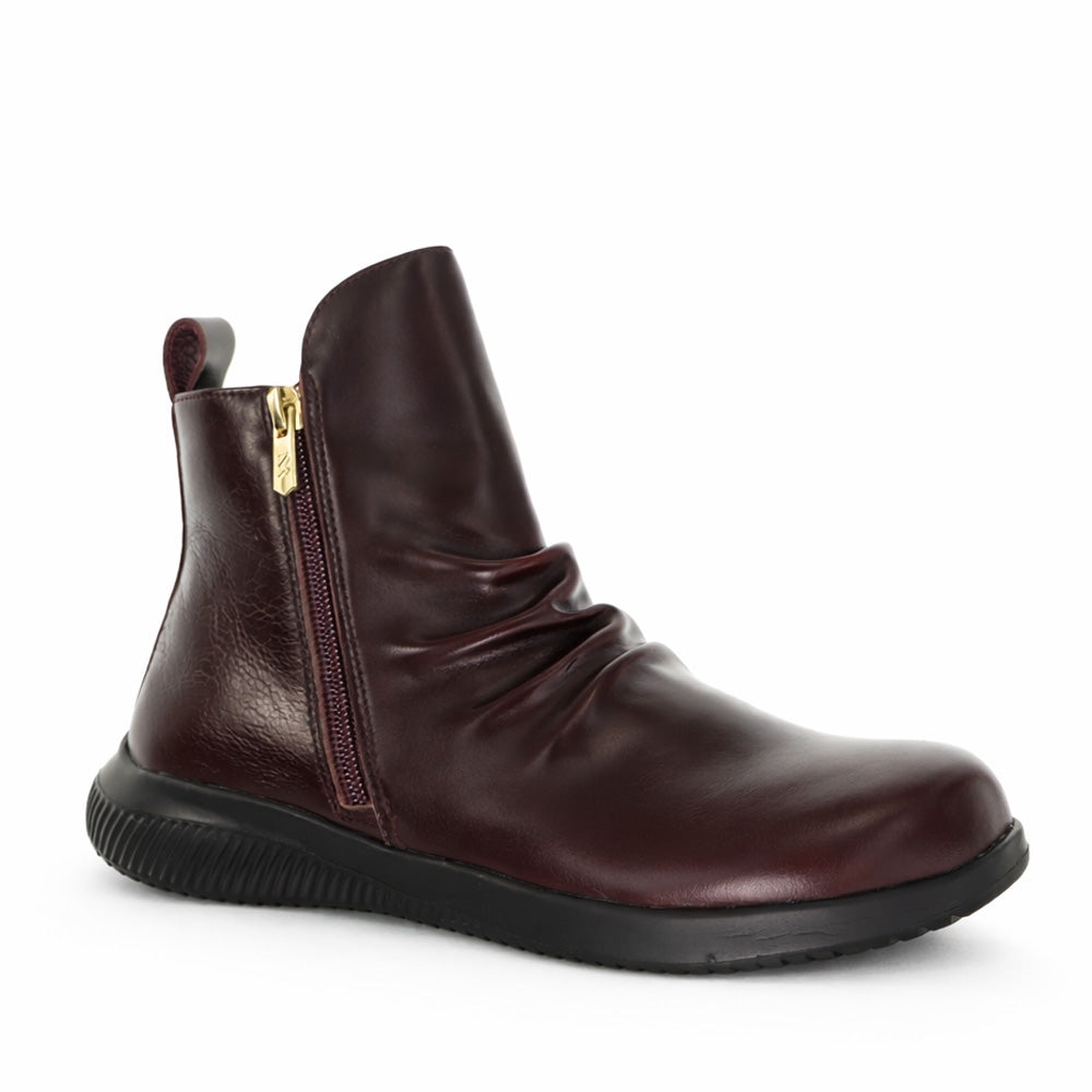 Naked Arches Yila Wine boots with pointed toes and sleek design, featuring a rich wine-colored leather finish.