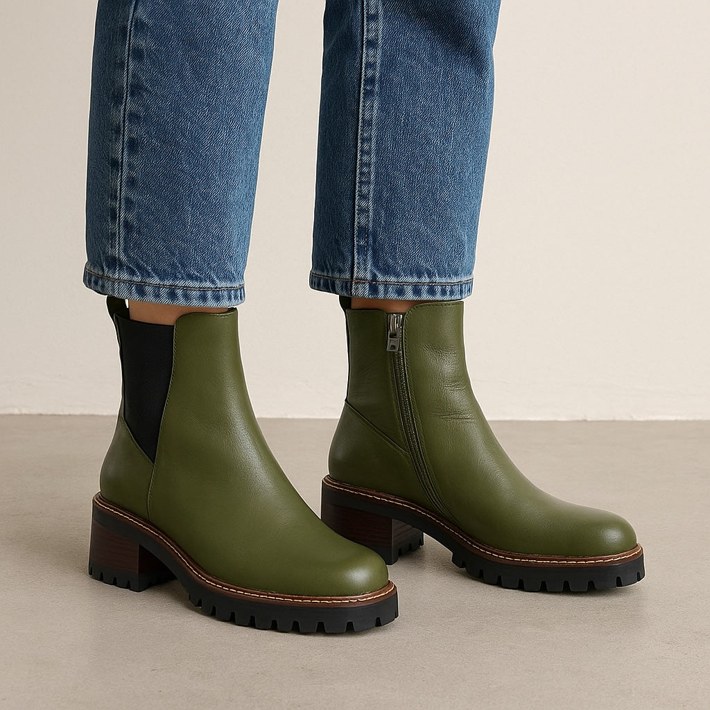 Le Sansa Lesansa Zina Olive boots featuring tan leather and ankle-high design with decorative stitching.