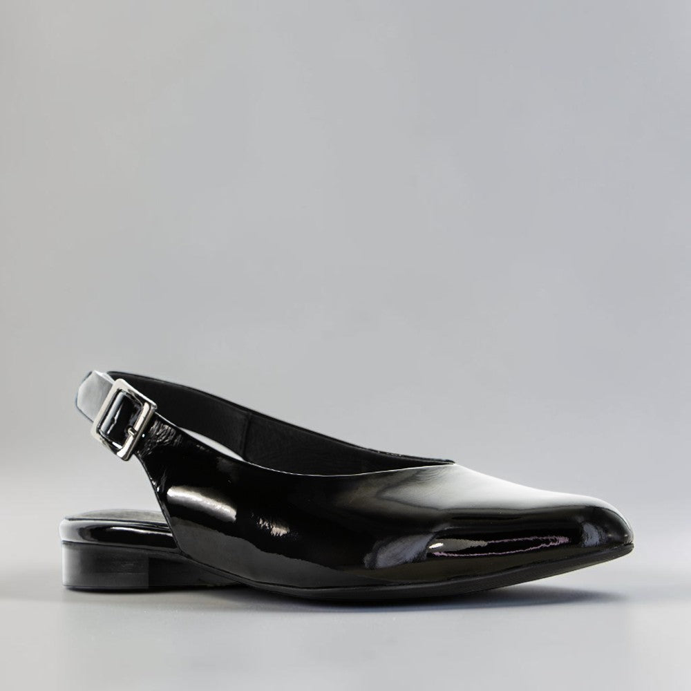 NAKED ARCHES Zodiac Black Patent sandals with sleek black patent straps and open toe design.