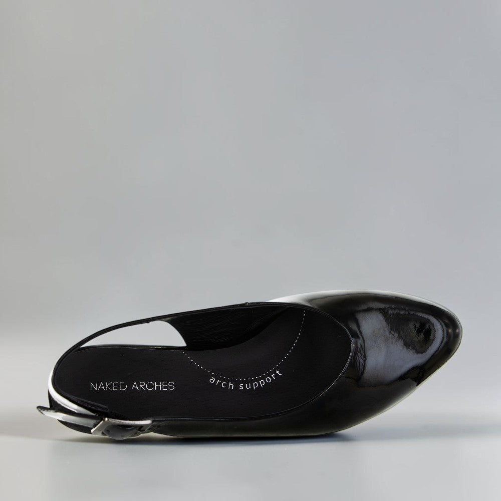 NAKED ARCHES Zodiac Black Patent sandals featuring sleek black patent leather straps and zodiac-inspired design details.