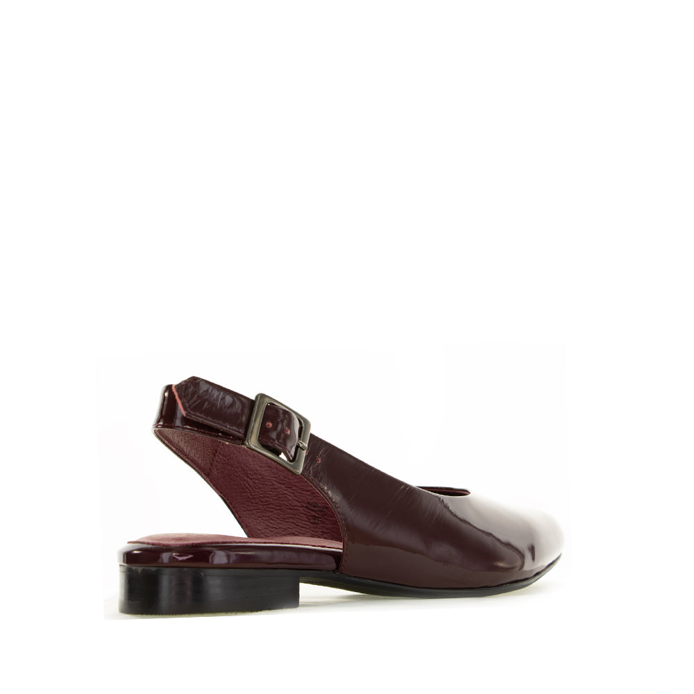 Naked Arches Zodiac Merlot sandals featuring a stylish zodiac print in merlot color with comfortable straps.