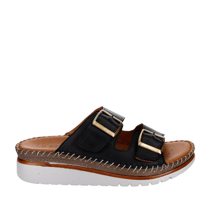 Le Sansa Freya black slip-ons with sleek design and comfortable fit, shown in a close-up image highlighting the stylish upper.