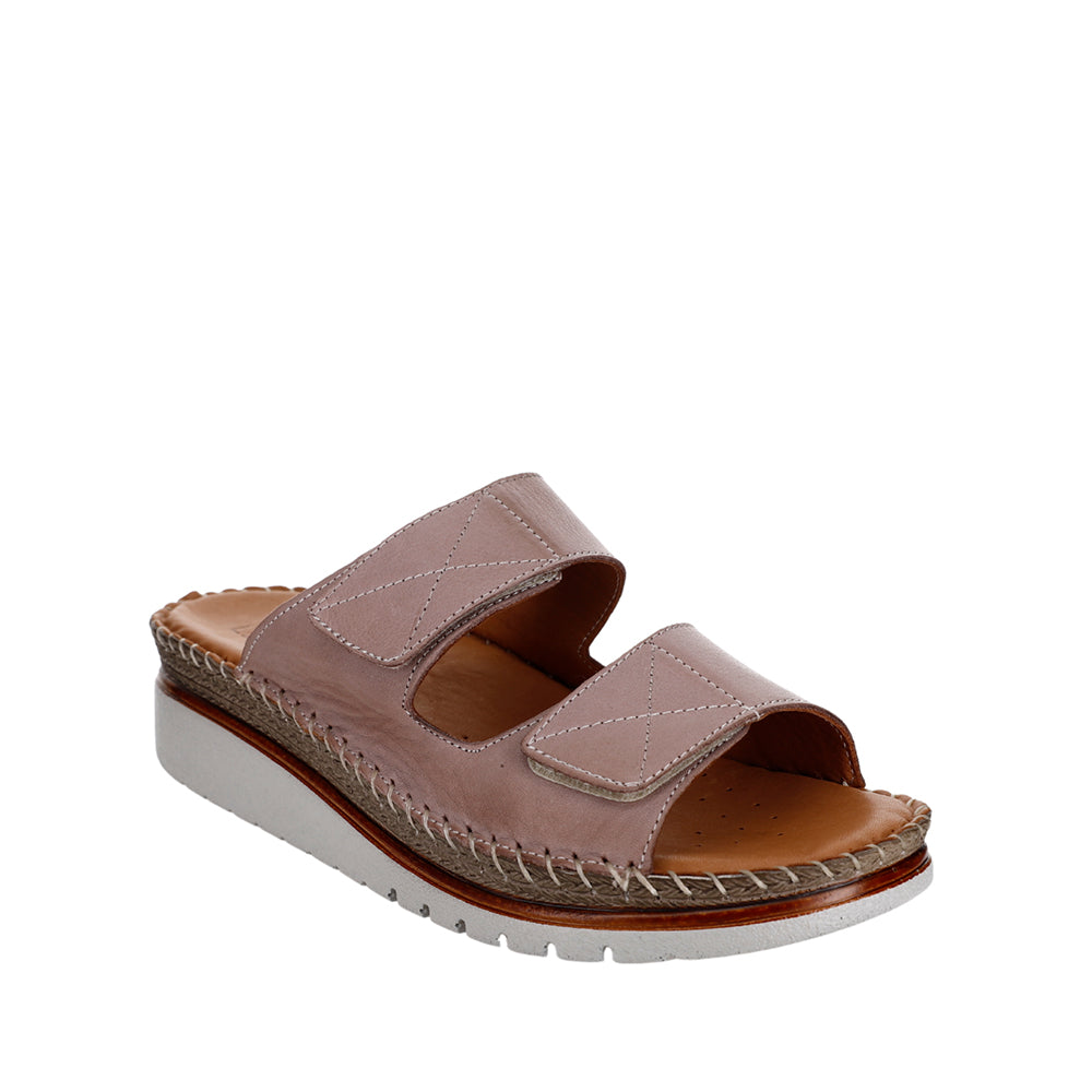 Le Sansa Lesansa Faye slip-on shoes in neutral color, showcasing their comfortable, stylish design and casual footwear style.