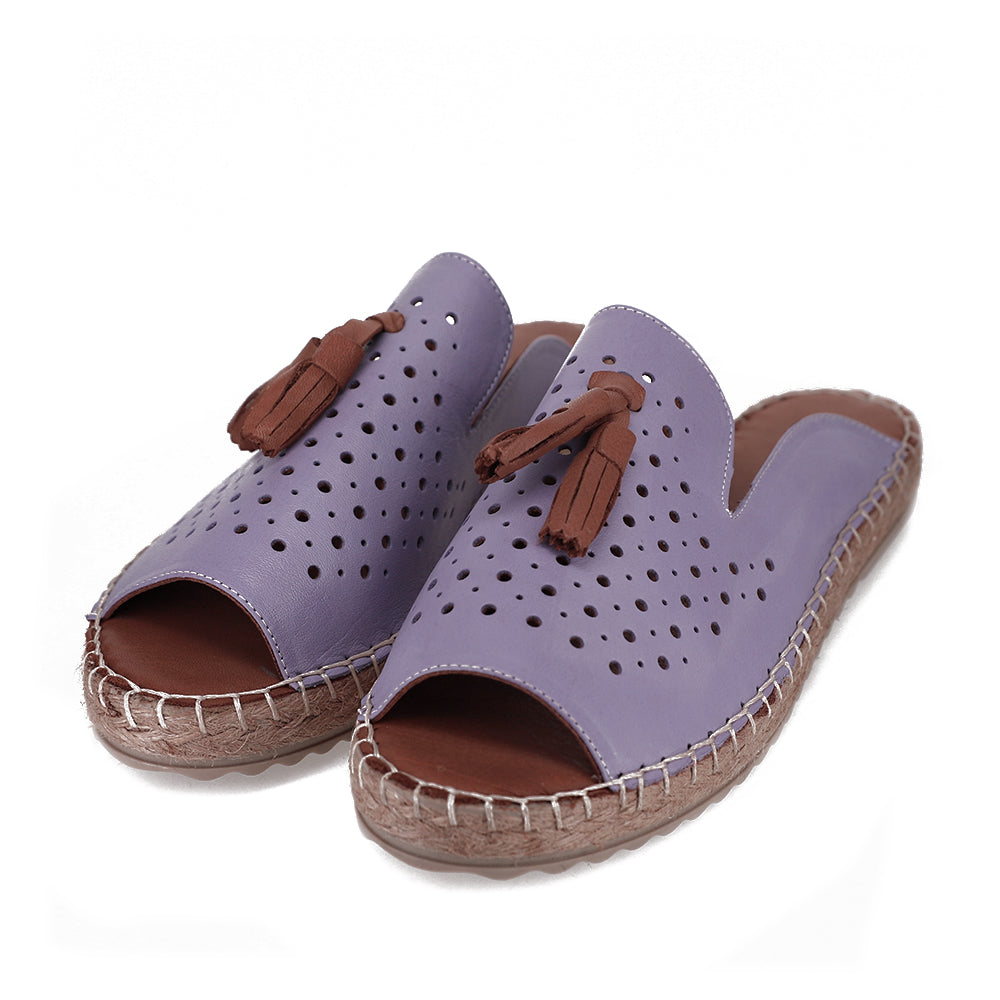 Le Sansa Sansa Dolonda lavender slip-ons with soft fabric upper and comfortable sole, ideal for casual wear.