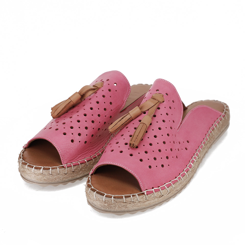 Le Sansa Dolonda slip-on shoes in vibrant fuchsia color, featuring a sleek design and comfortable fit.