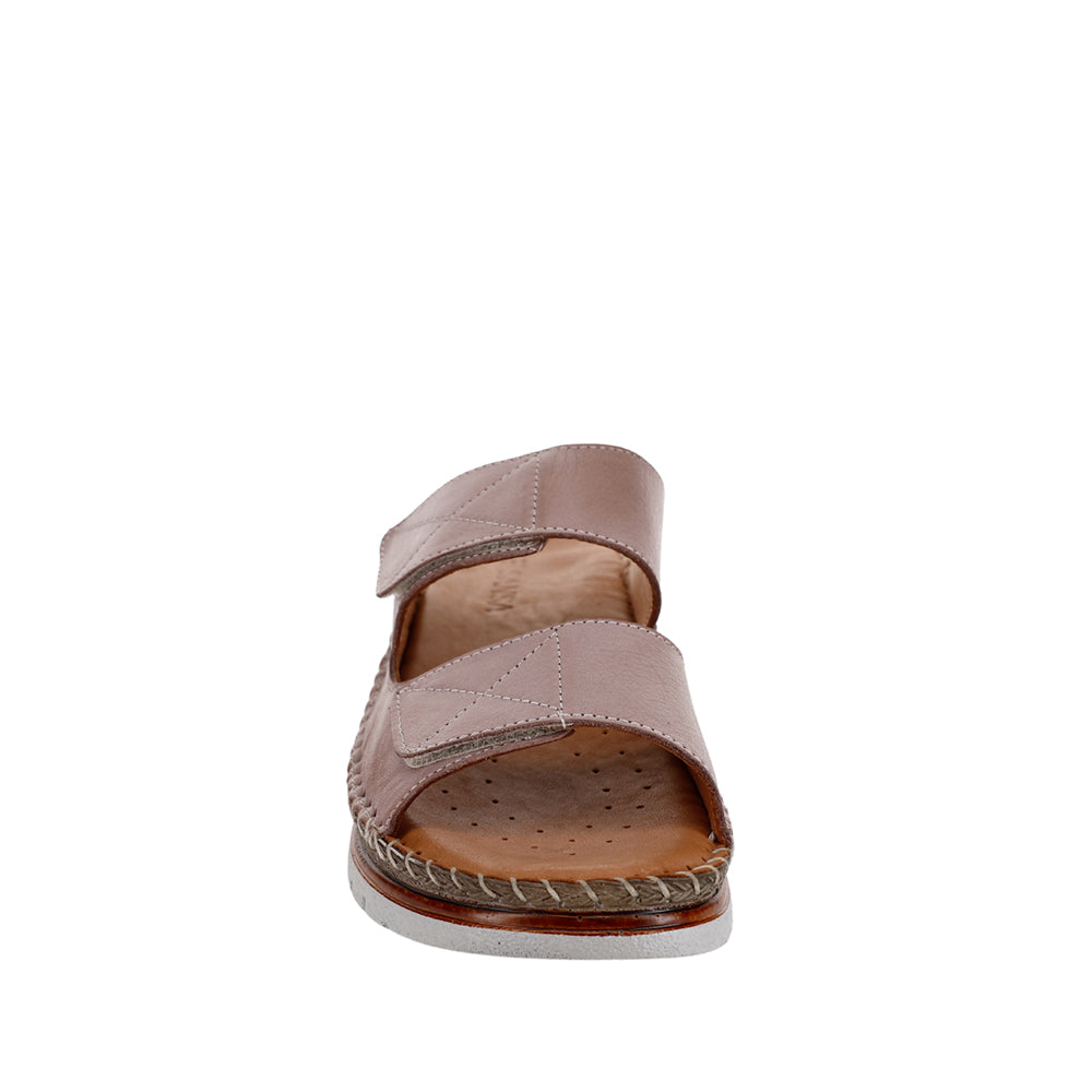 Le Sansa Lesansa Faye slip-on shoes in neutral tones, featuring a sleek design with comfortable fit and stylish detailing.