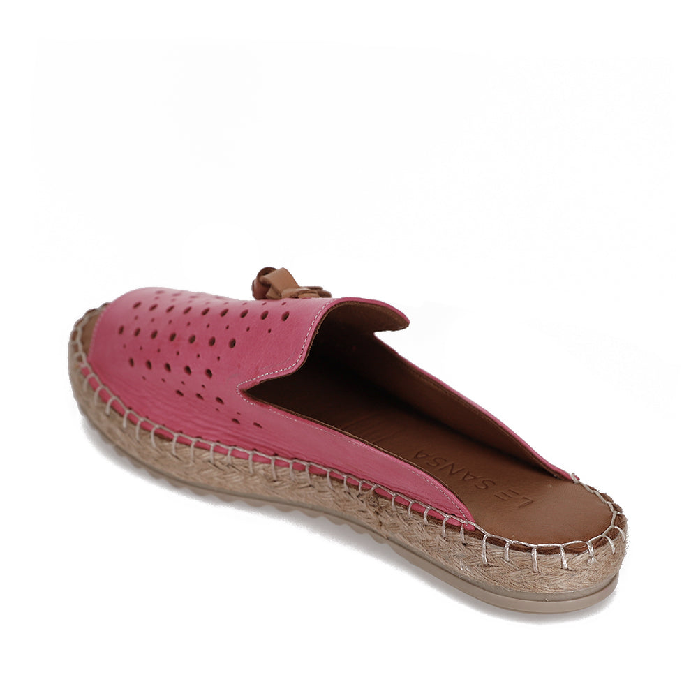 Le Sansa Dolonda slip-on shoes in fuchsia with a rounded toe and casual design, shown on a neutral background.