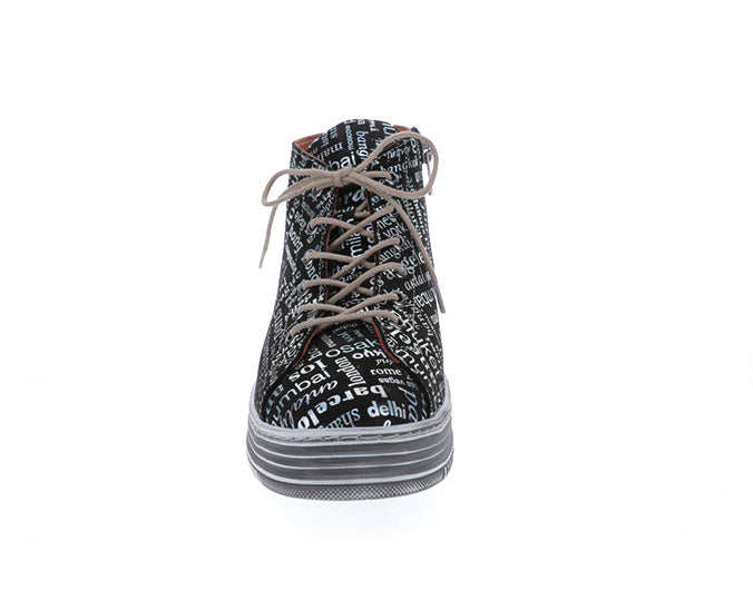 Le Sansa Vivid Black Print boots with a sleek design and bold graphic pattern, featuring a fitted ankle and stylish leather finish.