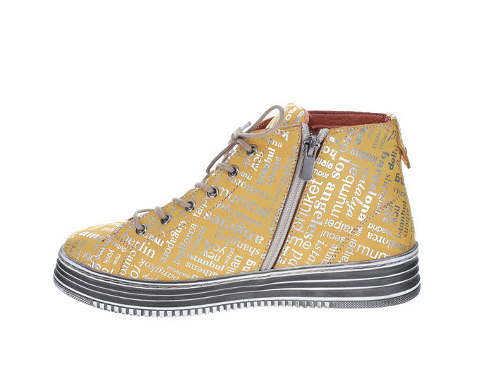 Le Sansa Vivid Mustard Print boots with colorful pattern, stylish ankle footwear, showcasing vibrant design and comfortable fit.