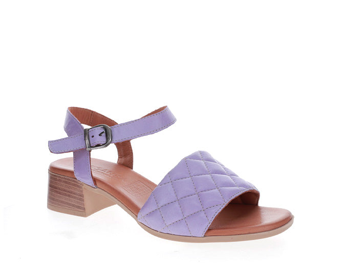 Le Sansa Lincoln Lilac sandals with open toe design and ankle strap, featuring a soft lilac color and comfortable flat sole.