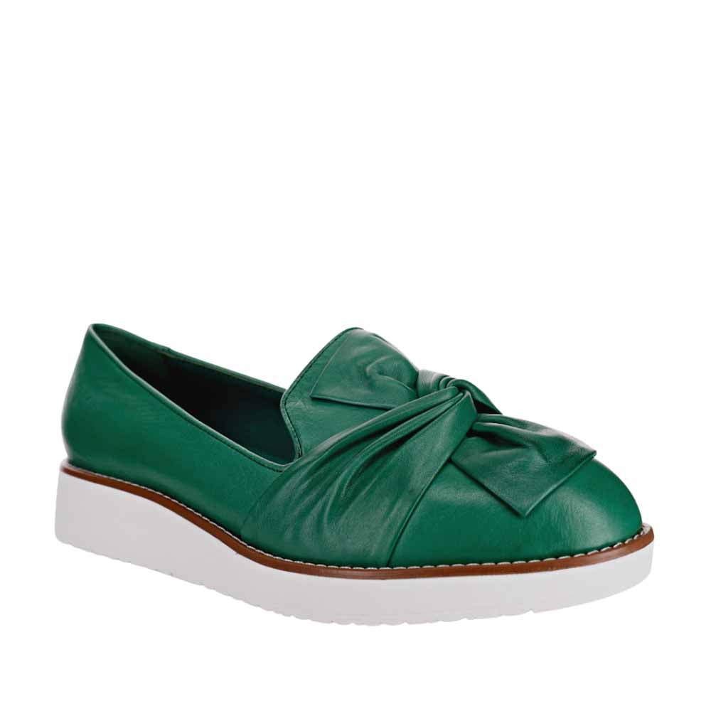 Le Sansa Lesansa Rosie Pine slip-on shoes with floral pattern and comfortable design, shown from a front view.