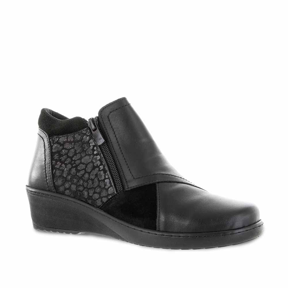 Black Cabello CABELLO CP462-18 boots with sleek design and sturdy sole, shown from the side view.