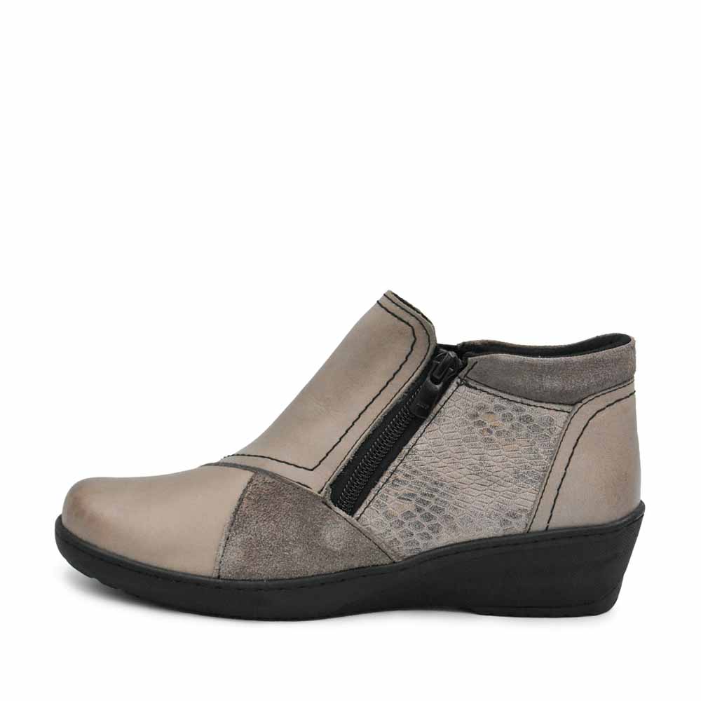 Taupe Cabello boots, style CP462-18, with a sleek design and ankle-length silhouette, shown in a close-up image.