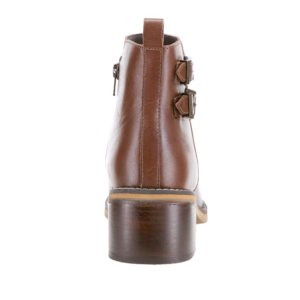 Le Sansa deep chocolate boots with ankle height and sleek design, perfect for stylish winter wear.