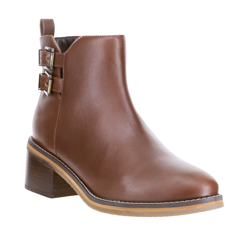 Le Sansa deep chocolate boots with sleek design and ankle height, perfect for stylish winter or fall wear.