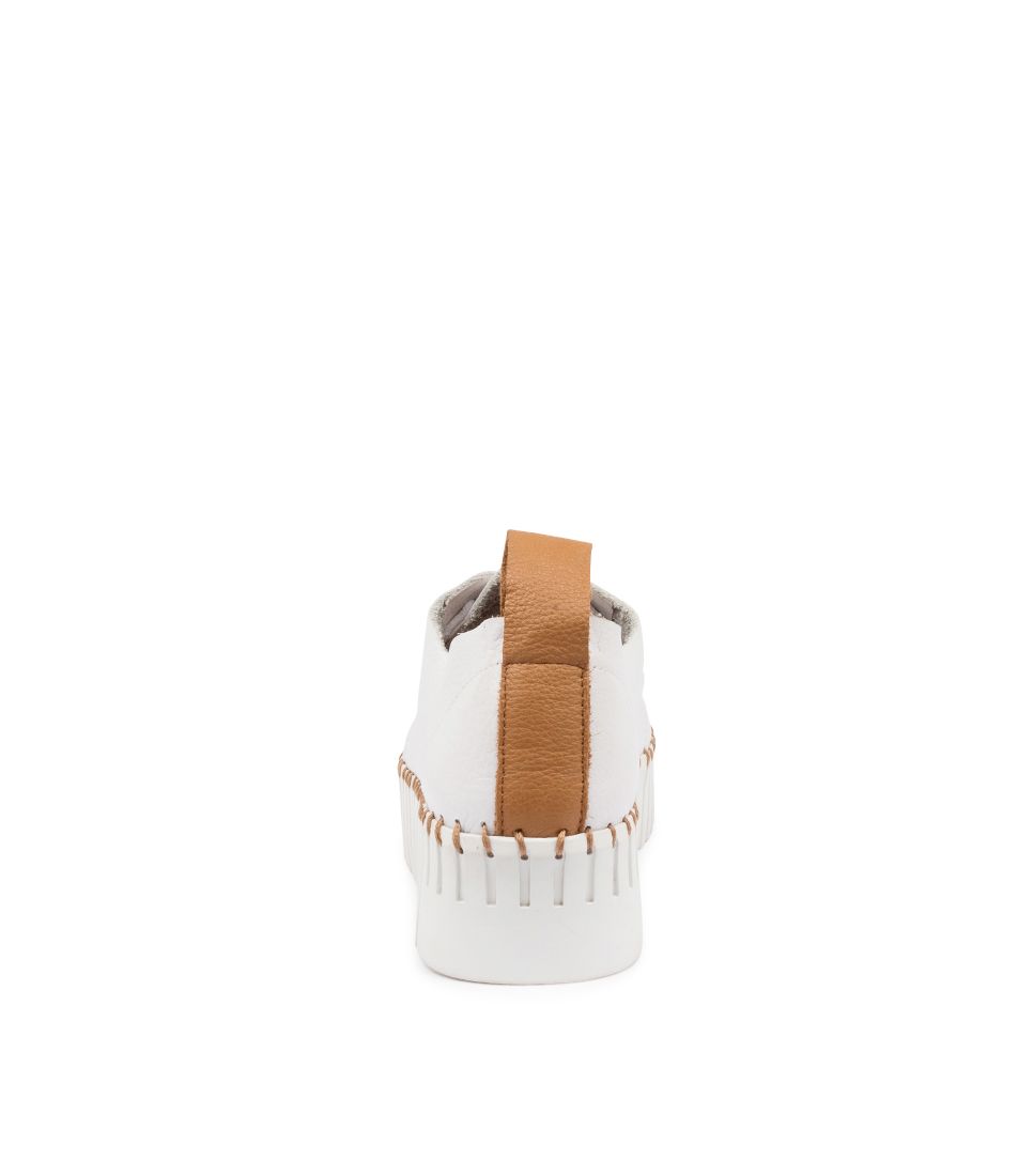 Django & Juliette Batu White sneakers with dark tan accents, featuring a casual slip-on style and textured sole.