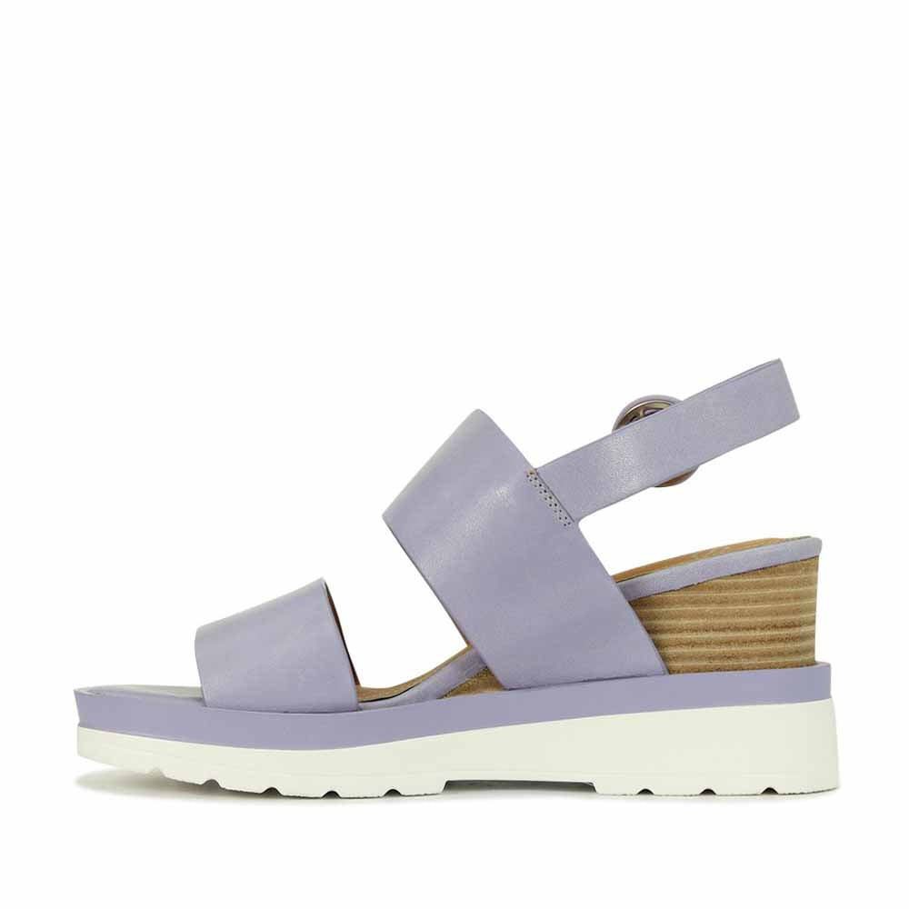 Eos Jades Lilac sandals with open toes and ankle straps, featuring a soft lilac color and stylish design.
