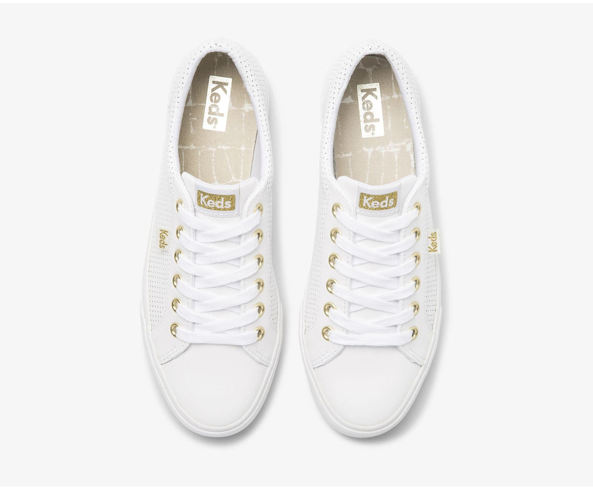 KEDS Jump Kick sneakers in white with gold accents, stylish sneakers designed for casual wear.