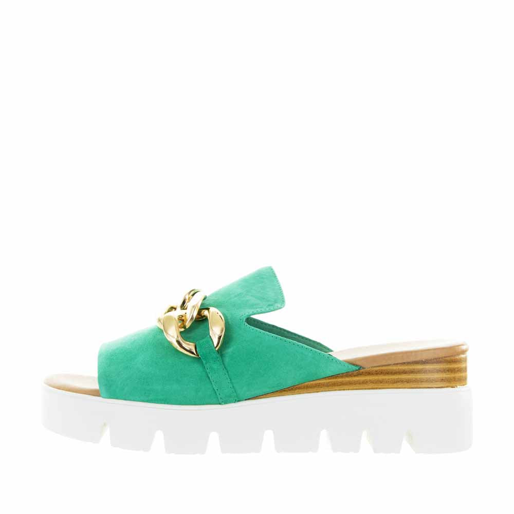 Django & Juliette Rablise Lt Emerald slip-on shoes with pointed toes and sleek design, displayed on a neutral background.