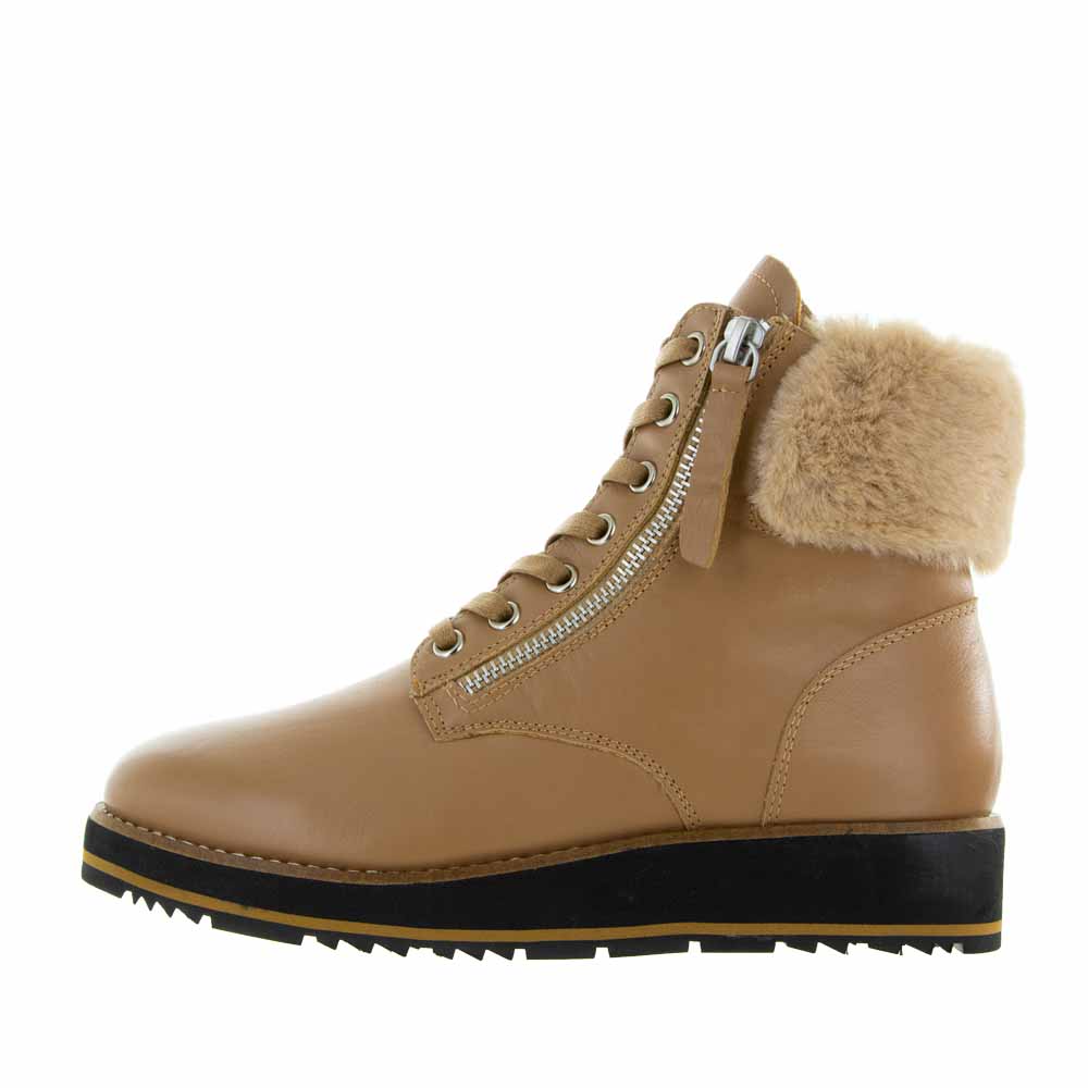 Le Sansa Lesansa Snap Tan boots featuring a sleek design, tan leather finish, and stylish ankle height.