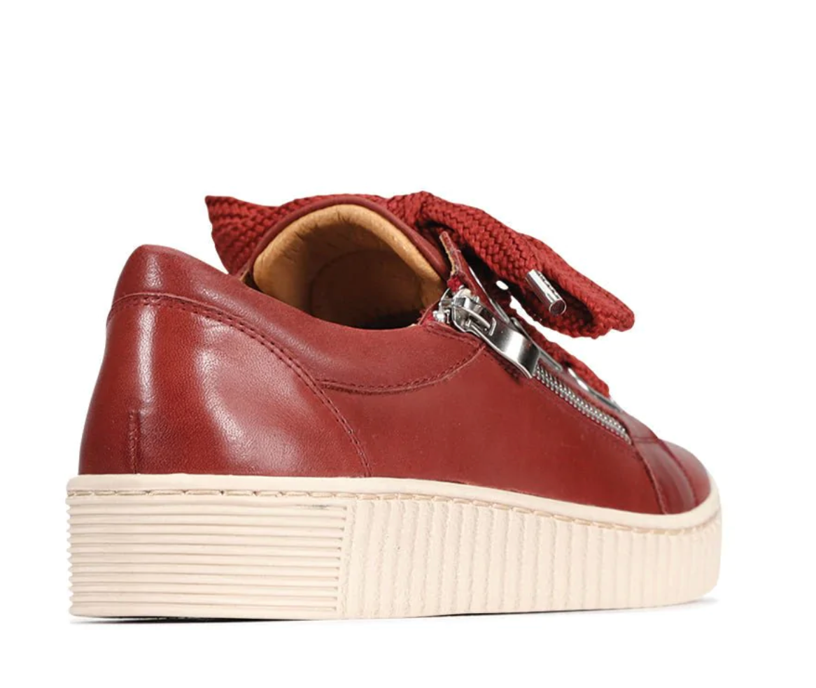 Eos Jovi Heena sneakers in vibrant color with stylish design, showcasing comfortable athletic footwear for casual wear.