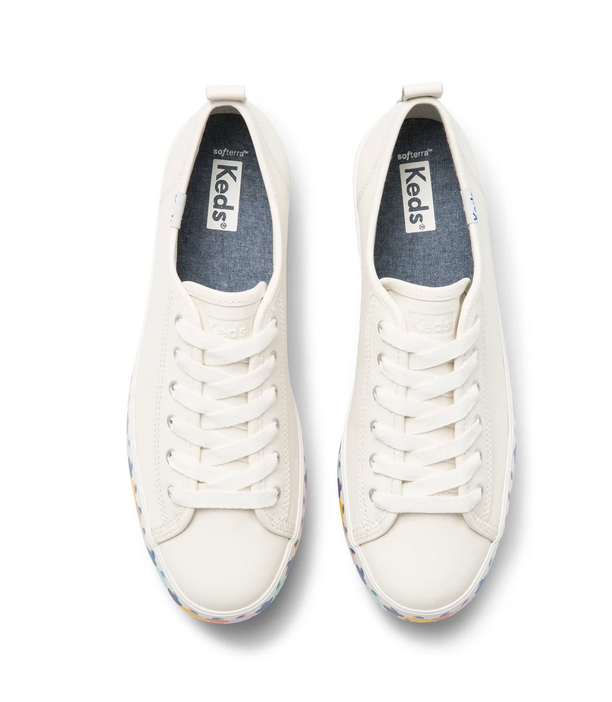 KEDS Triple Up Rainbow People sneakers showing colorful rainbow design on white canvas with laces and rubber sole.