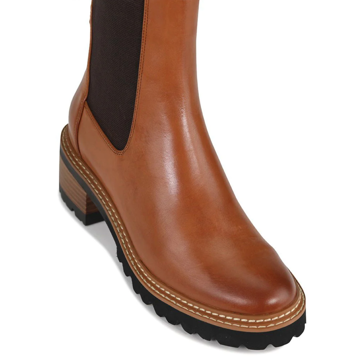 Eos Linear Brandy boots featuring sleek design, ankle height, and stylish leather finish for casual or fashionable wear.