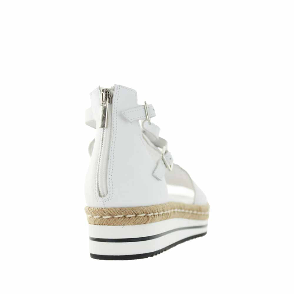 Django & Juliette Alexys white sandals with open toes and ankle straps, stylish summer footwear for women.