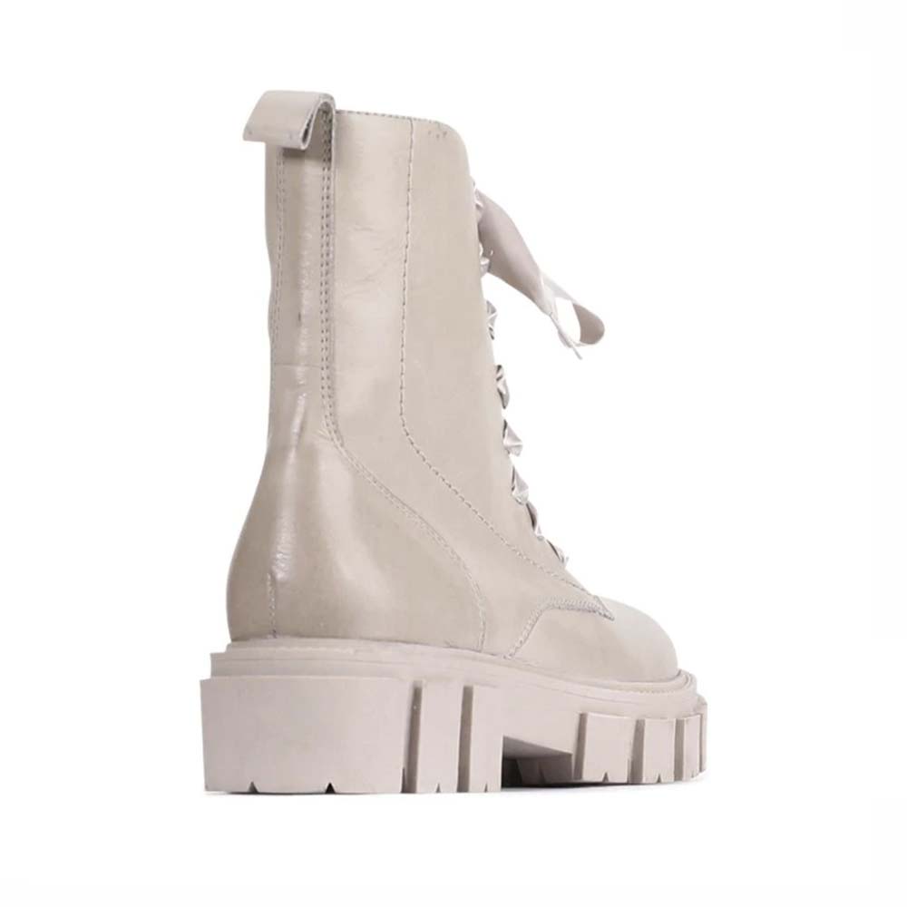 Eos Febe Stone boots in neutral tones, featuring a sleek ankle design and stylish stitching details.